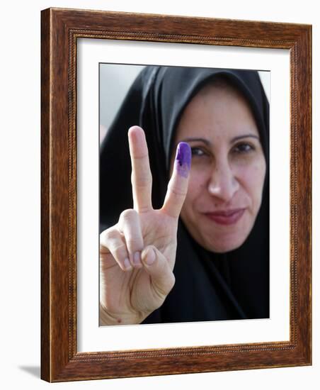 Iraqi Woman Holds Up Her Purple Finger, Indicating She Has Just Voted in Southern Iraq-null-Framed Photographic Print