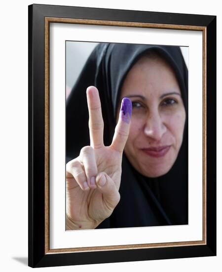 Iraqi Woman Holds Up Her Purple Finger, Indicating She Has Just Voted in Southern Iraq-null-Framed Photographic Print