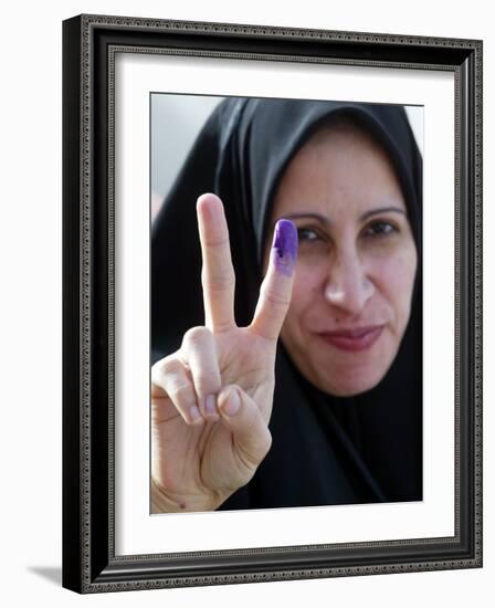 Iraqi Woman Holds Up Her Purple Finger, Indicating She Has Just Voted in Southern Iraq-null-Framed Photographic Print