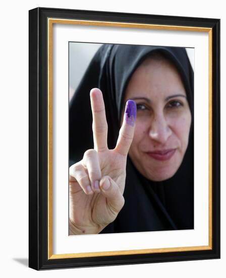 Iraqi Woman Holds Up Her Purple Finger, Indicating She Has Just Voted in Southern Iraq-null-Framed Photographic Print