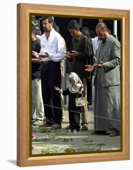 Iraqis, Inluding a Little Girl, Pause to Pray-null-Framed Premier Image Canvas