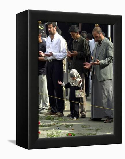 Iraqis, Inluding a Little Girl, Pause to Pray-null-Framed Premier Image Canvas