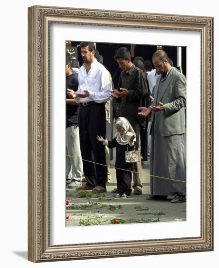 Iraqis, Inluding a Little Girl, Pause to Pray-null-Framed Photographic Print