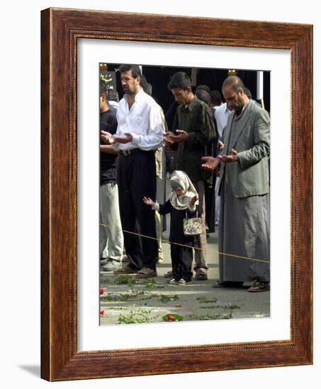 Iraqis, Inluding a Little Girl, Pause to Pray-null-Framed Photographic Print