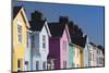 Ireland, County Antrim, Whitehead, colorful houses-Walter Bibikow-Mounted Photographic Print