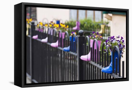 Ireland, County Kerry Cloghane, fence decorated with children's boots-Walter Bibikow-Framed Premier Image Canvas