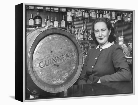 Irish Barmaid at Airport Bar with Keg of Guinness Beer-Nat Farbman-Framed Premier Image Canvas