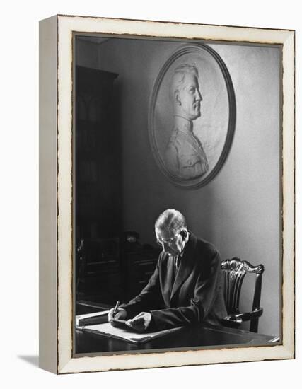 Irish President Eamon de Valera Working under a Plaque of Irish Revolutionary Michael Collins-Carl Mydans-Framed Premier Image Canvas