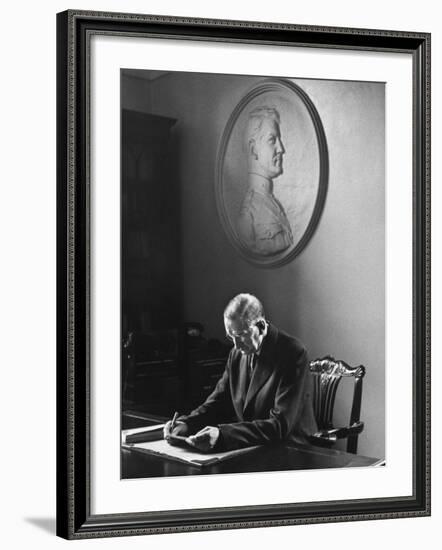 Irish President Eamon de Valera Working under a Plaque of Irish Revolutionary Michael Collins-Carl Mydans-Framed Premium Photographic Print