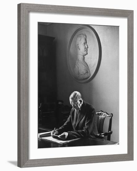 Irish President Eamon de Valera Working under a Plaque of Irish Revolutionary Michael Collins-Carl Mydans-Framed Premium Photographic Print