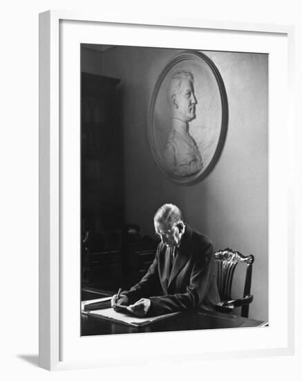 Irish President Eamon de Valera Working under a Plaque of Irish Revolutionary Michael Collins-Carl Mydans-Framed Premium Photographic Print