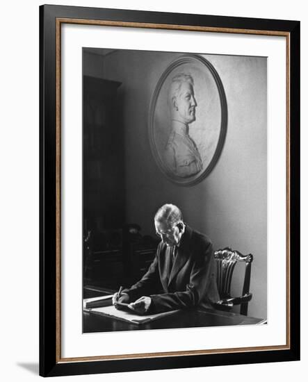 Irish President Eamon de Valera Working under a Plaque of Irish Revolutionary Michael Collins-Carl Mydans-Framed Premium Photographic Print