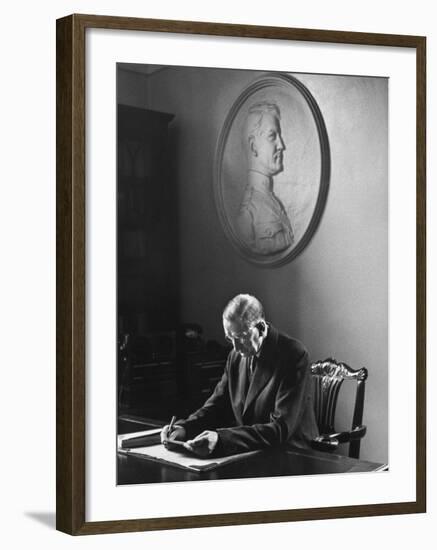 Irish President Eamon de Valera Working under a Plaque of Irish Revolutionary Michael Collins-Carl Mydans-Framed Premium Photographic Print