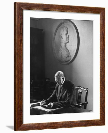 Irish President Eamon de Valera Working under a Plaque of Irish Revolutionary Michael Collins-Carl Mydans-Framed Premium Photographic Print