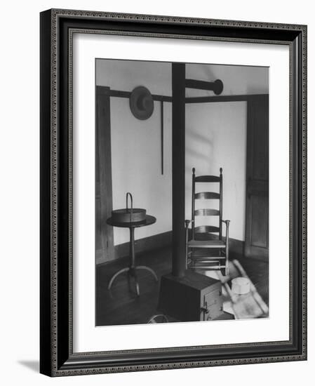 Iron Woodstove with a Ladder Backed Wooden Armchair in a Restored Shaker Parlor-John Loengard-Framed Photographic Print