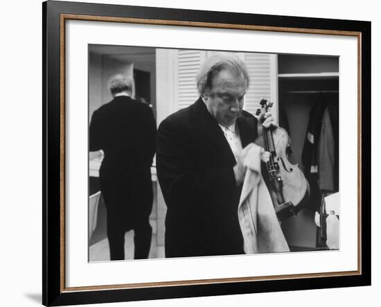 Isaac Stern Wiping His Violin Backstage-Gjon Mili-Framed Premium Photographic Print