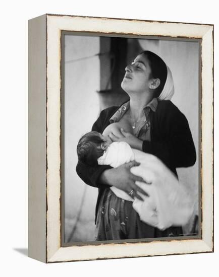 Israeli Mother Breast Feeding Her Baby-Paul Schutzer-Framed Premier Image Canvas