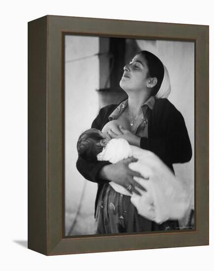 Israeli Mother Breast Feeding Her Baby-Paul Schutzer-Framed Premier Image Canvas