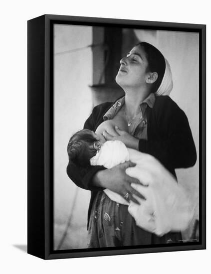 Israeli Mother Breast Feeding Her Baby-Paul Schutzer-Framed Premier Image Canvas