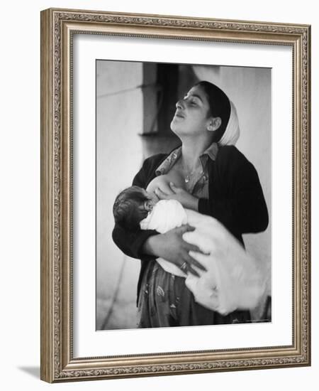 Israeli Mother Breast Feeding Her Baby-Paul Schutzer-Framed Photographic Print