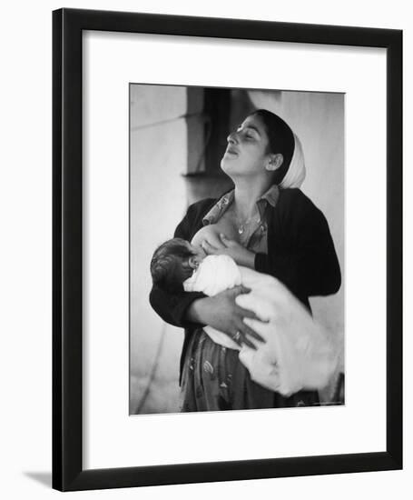 Israeli Mother Breast Feeding Her Baby-Paul Schutzer-Framed Photographic Print