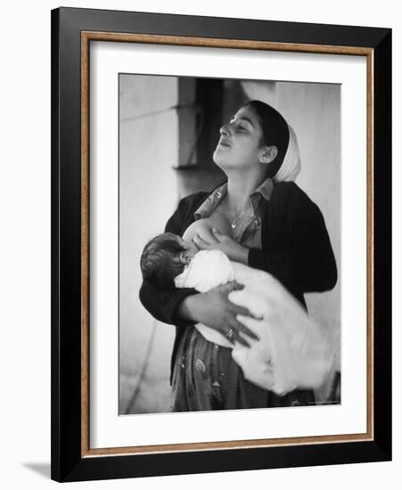 Israeli Mother Breast Feeding Her Baby-Paul Schutzer-Framed Photographic Print
