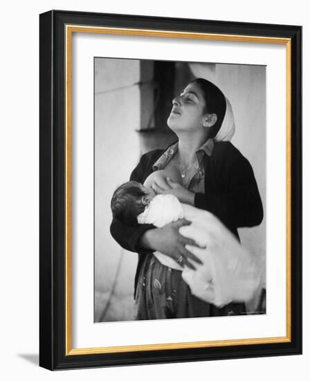 Israeli Mother Breast Feeding Her Baby-Paul Schutzer-Framed Photographic Print