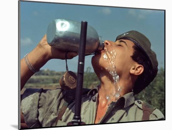 Israeli Soldier Drinking from Canteen-Paul Schutzer-Mounted Photographic Print