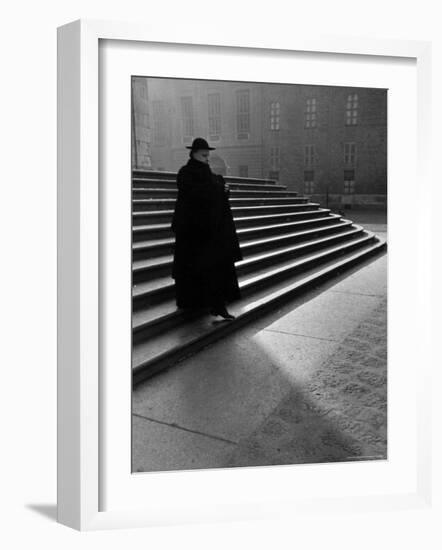 Italian Catholic Priest Majestically Descending Stairs-Alfred Eisenstaedt-Framed Photographic Print