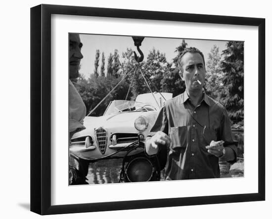 Italian director Michelangelo Antonioni (1912 - 2007) on the set of hid film L'eclisse 1961 (b/w ph-null-Framed Photo