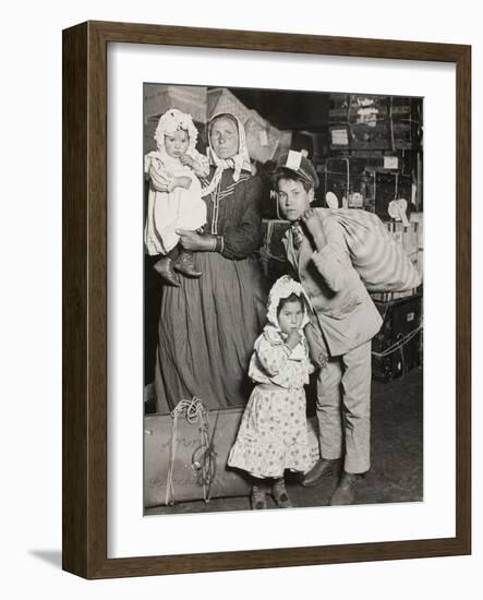 Italian Family Seeking Lost Baggage, Ellis Island, 1905-Lewis Wickes Hine-Framed Photographic Print