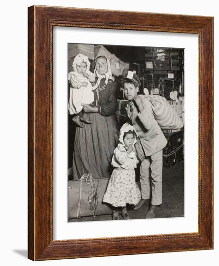 Italian Family Seeking Lost Baggage, Ellis Island, 1905-Lewis Wickes Hine-Framed Photographic Print