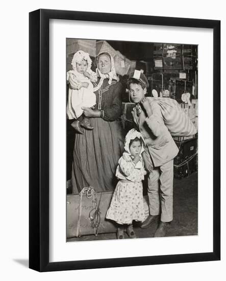 Italian Family Seeking Lost Baggage, Ellis Island, 1905-Lewis Wickes Hine-Framed Photographic Print