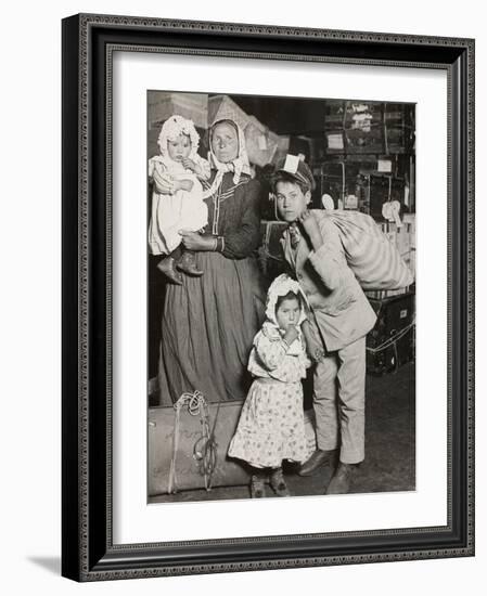 Italian Family Seeking Lost Baggage, Ellis Island, 1905-Lewis Wickes Hine-Framed Photographic Print