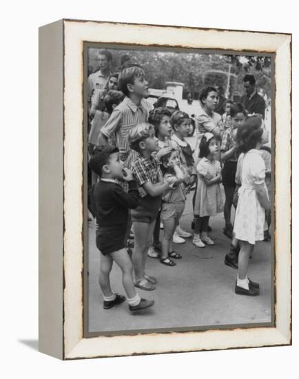 Italian Kids Watching Outdoor Puppet Show-Dmitri Kessel-Framed Premier Image Canvas