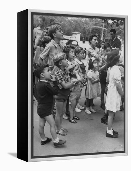 Italian Kids Watching Outdoor Puppet Show-Dmitri Kessel-Framed Premier Image Canvas