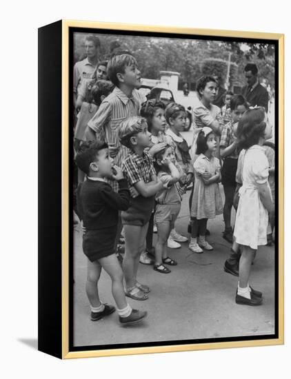 Italian Kids Watching Outdoor Puppet Show-Dmitri Kessel-Framed Premier Image Canvas