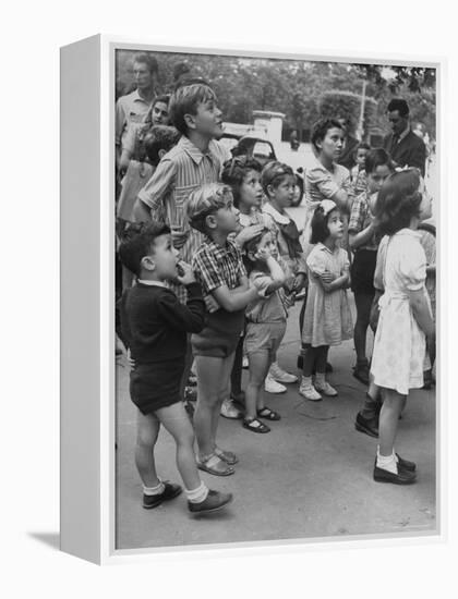 Italian Kids Watching Outdoor Puppet Show-Dmitri Kessel-Framed Premier Image Canvas