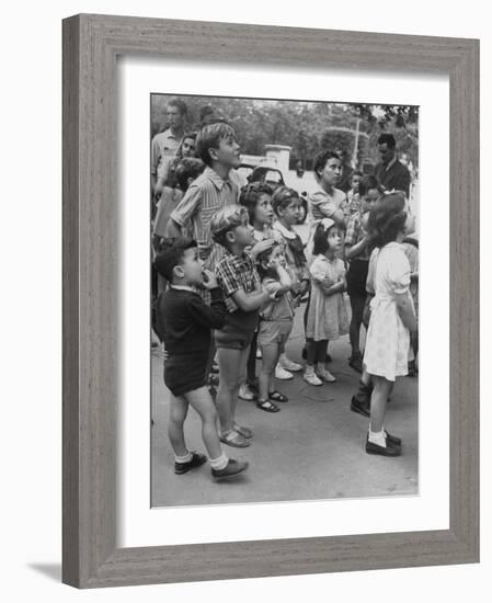 Italian Kids Watching Outdoor Puppet Show-Dmitri Kessel-Framed Photographic Print