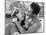 Italian Man Combing His Girlfriend's Hair-Paul Schutzer-Mounted Photographic Print