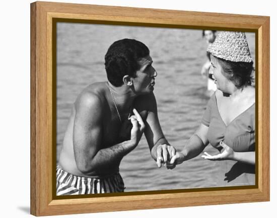 Italian Man Talking to a Woman While Enjoying a Day at the Beach-Paul Schutzer-Framed Premier Image Canvas