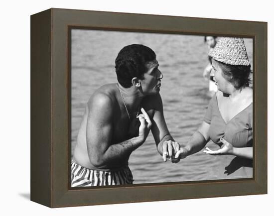 Italian Man Talking to a Woman While Enjoying a Day at the Beach-Paul Schutzer-Framed Premier Image Canvas