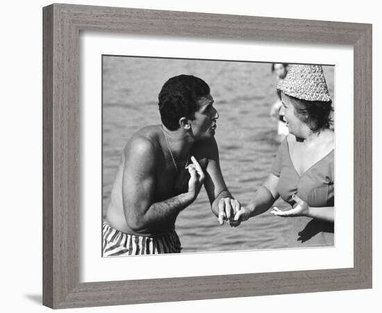 Italian Man Talking to a Woman While Enjoying a Day at the Beach-Paul Schutzer-Framed Photographic Print