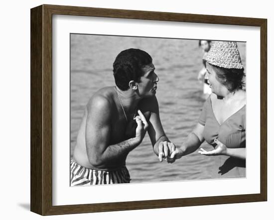 Italian Man Talking to a Woman While Enjoying a Day at the Beach-Paul Schutzer-Framed Photographic Print