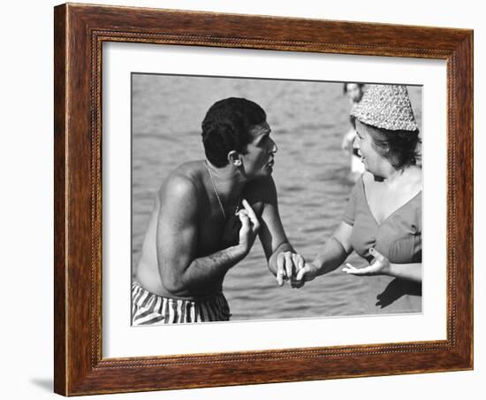 Italian Man Talking to a Woman While Enjoying a Day at the Beach-Paul Schutzer-Framed Photographic Print