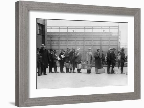 Italian Men Await Admission Processing at Ellis Island, Ca. 1910-null-Framed Photo