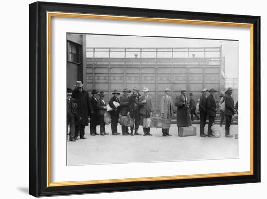 Italian Men Await Admission Processing at Ellis Island, Ca. 1910-null-Framed Photo