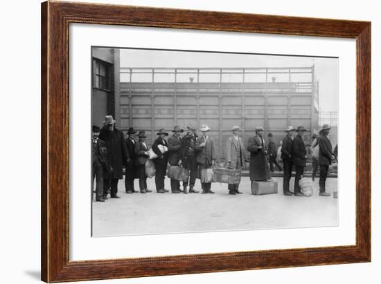 Italian Men Await Admission Processing at Ellis Island, Ca. 1910-null-Framed Photo