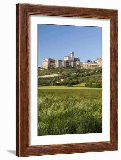 Italy, Assisi. The religious compound of Assisi sits on a prominent hill above meadows and fields i-Brenda Tharp-Framed Photographic Print