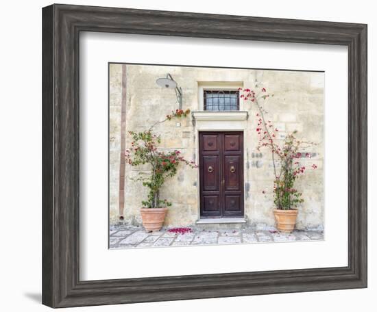 Italy, Basilicata, Matera. Flowers adorning the entrance of a Sassi house.-Julie Eggers-Framed Photographic Print